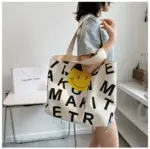 smily face black canvas bag