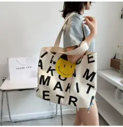 smily face black canvas bag