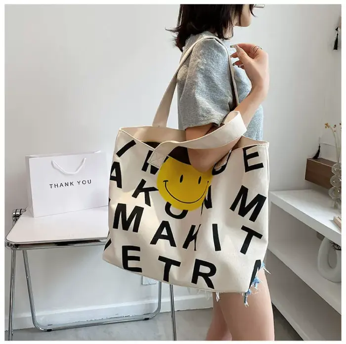 smily face black canvas bag